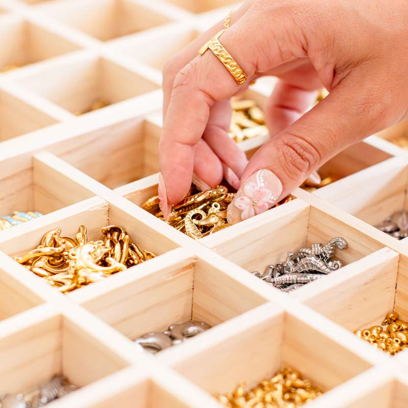 Picking of your favorite charms at Charm Bar Prague