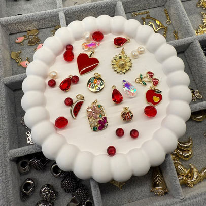 Red charms on display at Charm Bar Prague