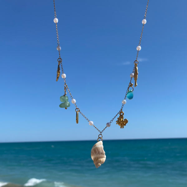 Charm Bar Prague bracelet photographed while traveling at the sea